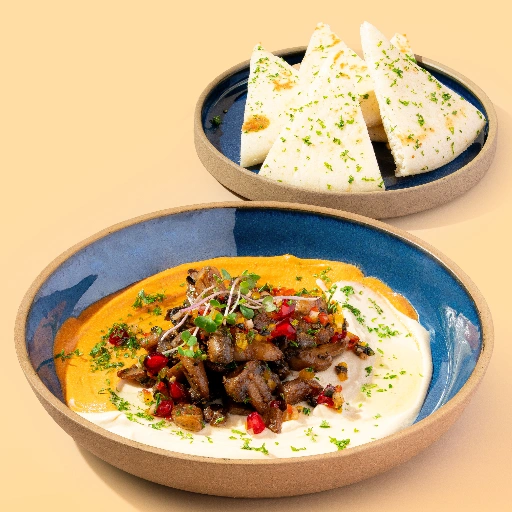 Sautéed Garlic Mushroom On Hummus