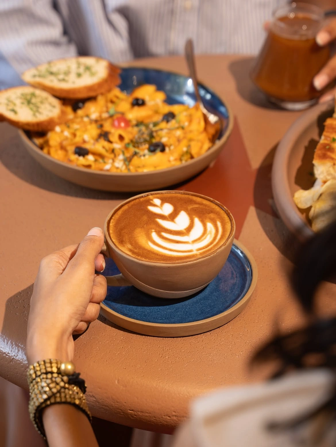 A classic cappuccino with warm velvety foam at Four Coffee